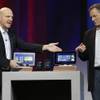 Microsoft CEO Steve Ballmer, left, and Qualcomm CEO Paul Jacobs talk about various Windows based products that utilize Qualcomm technology during Jacobs' keynote address at the Consumer Electronics Show, Monday, Jan. 7, 2013, in Las Vegas. 