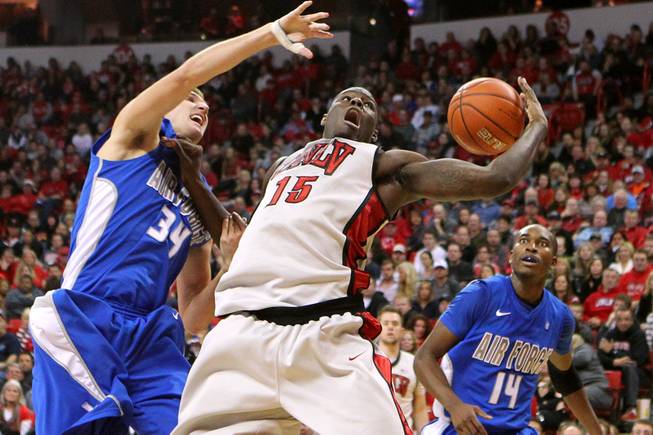 UNLV forward Anthony Bennett loses the ball after being fouled by Force center Taylor Broekhuls during their game Saturday, Jan. 12, 2013 at the Thomas & Mack. UNLV won in overtime, 76-71.