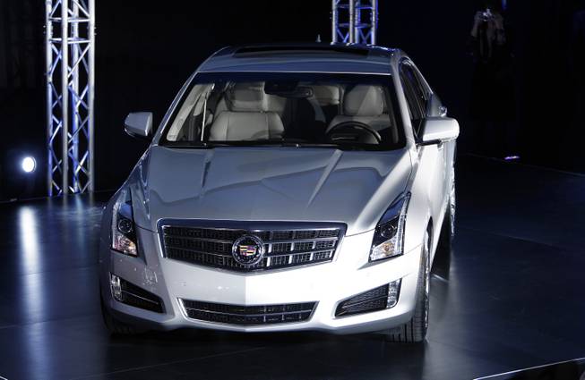 The 2013 Cadillac ATS makes its debut prior to the North American International Auto Show in Detroit, Sunday, Jan. 8, 2012.