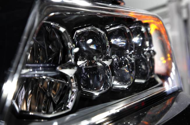 A headlight on the 2014 Acura RLX is shown at media previews for the North American International Auto Show in Detroit, Tuesday, Jan. 15, 2013.