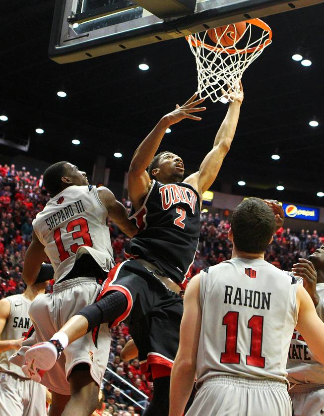 UNLV forward Khem Birch gets a put back to seal the Rebels win over San Diego State during their game Wednesday, Jan. 16, 2013 at Viejas Arena in San Diego. UNLV upset SDSU 82-75.