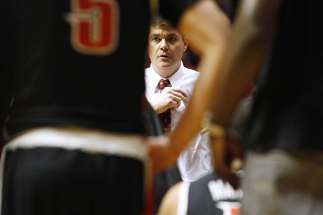 UNLV head coach Dave Rice waits to talk to his players during a time out in their game against San Diego State Wednesday, Jan. 16, 2013 at Viejas Arena in San Diego. UNLV upset SDSU 82-75.