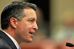 Nevada Gov. Brian Sandoval delivers the State of the State address at the Legislature in Carson City, Nev., on Wednesday, Jan. 16, 2013.