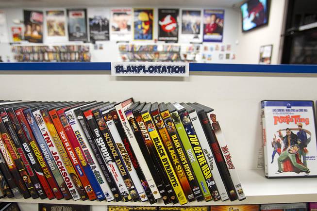 "Blaxploitation" films are displayed at Movies & Candy, 10895 S. Eastern Ave., Thursday, January 17, 2013. Movie fan Trevor Layne opened the video shop last November when his house started overflowing with movies.
