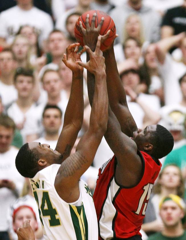 UNLV forward Anthony Bennett grabs a rebound from Colorado State forward Greg Smith during their game Saturday, Jan. 19, 2013 at Moby Arena in Ft. Collins, Colo. Colorado State won the game 66-61.