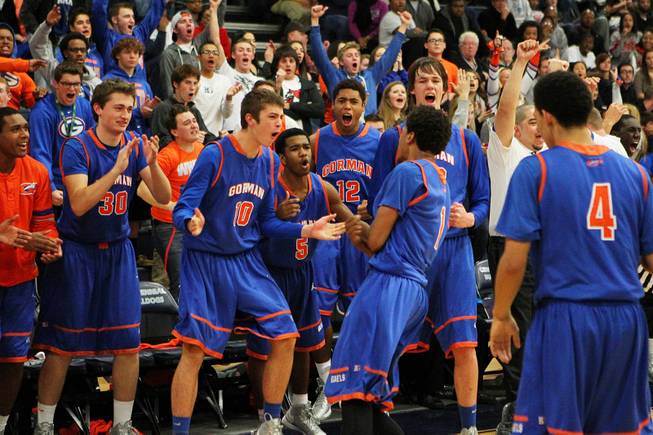 The Bishop Gorman bench celebrates as they pull ahead of Centennial during their game Tuesday, Jan 22, 2013 at Centennial. Bishop Gorman won 79-71.