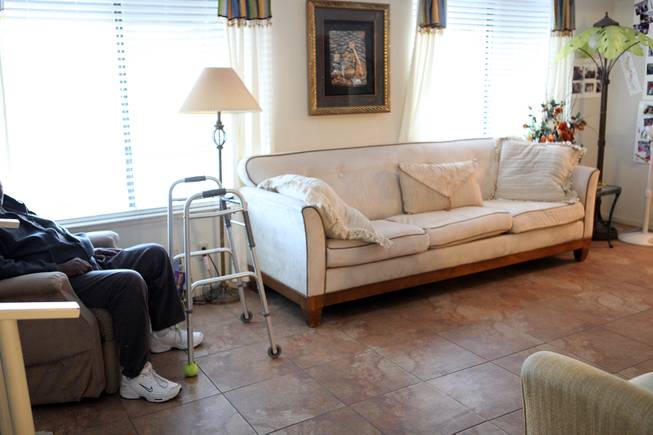 A resident rests in the living room at Sweet Home Belmont, an assisted living facility for seniors in Henderson on Tuesday, January 22, 2013.