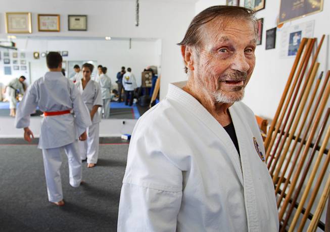 Karate master Dan Sawyer poses during a class at his home Sunday, Jan. 27, 2013. Sawyer teaches in a garage behind his home that has been converted into a karate dojo.