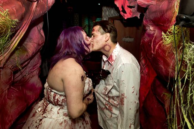 Rosie Grasso and Anthony Gallegos of Las Vegas kiss in a waiting area before getting married at Eli Roths Goretorium Sunday, Jan. 27, 2013. STEVE MARCUS