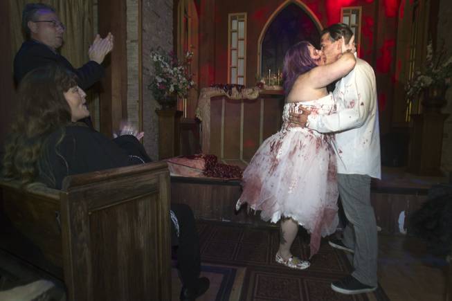 Rosie Grasso and Anthony Gallegos of Las Vegas kiss after getting married in Eli Roths Goretorium Sunday, Jan. 27, 2013. STEVE MARCUS
