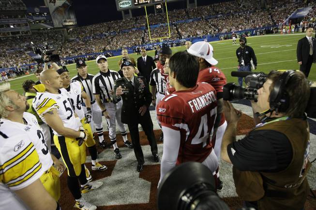 The coin toss prior to the NFL Super Bowl XLIII football game between the Pittsburgh Steelers and Arizona Cardinals, Sunday, Feb. 1, 2009, in Tampa, Fla.