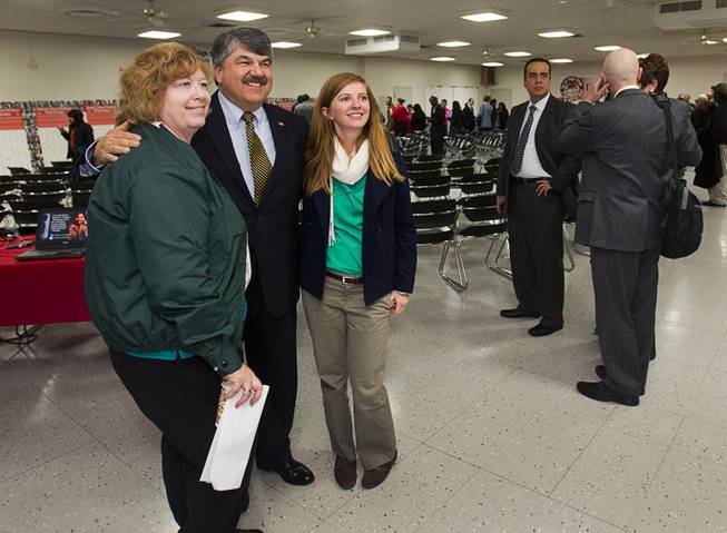 AFL-CIO President Richard Trumka, center, poses for a photo following a gathering of union leaders, working families and community partners at the Culinary Workers Local 226 union hall Tuesday, Jan. 29, 2013.