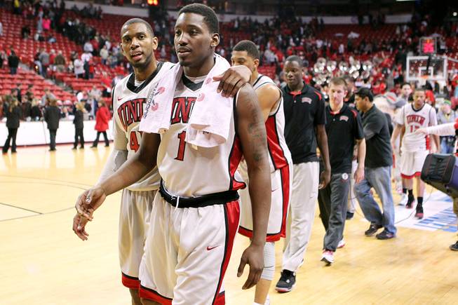 UNLV forwards Mike Moser and Quintrell Thomas head off the floor after their 66-54 win over UNR Tuesday, Jan. 29, 2013 at the Thomas & Mack.