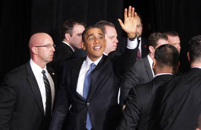 President Barack Obama waves to the crowd after speaking about immigration reform at Del Sol High School in Las Vegas on Tuesday, January 29, 2013.