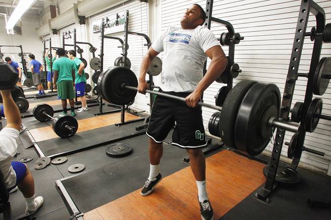 Green Valley High School football and basketball player Tyrell Crosby works out January 30, 2013.