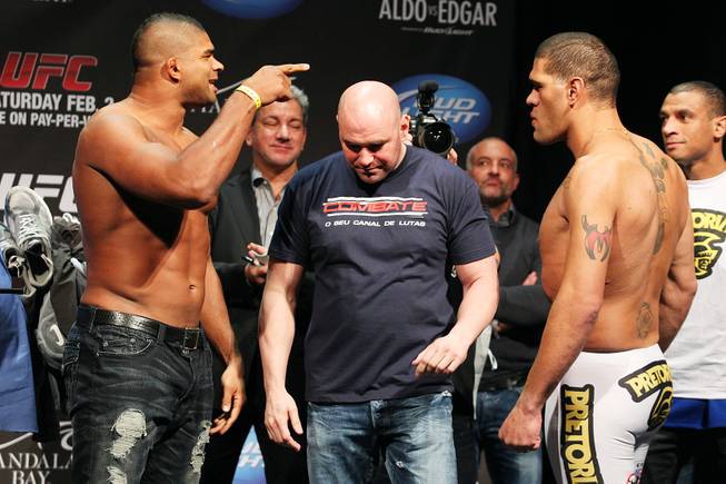 Heavyweight Alistair Overeem has words for Antonio Silva after facing off during weigh ins for UFC 156 Friday, Feb. 1, 2013.