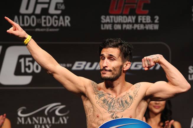 Ian McCall poses during weigh ins for UFC 156 Friday, Feb. 1, 2013.