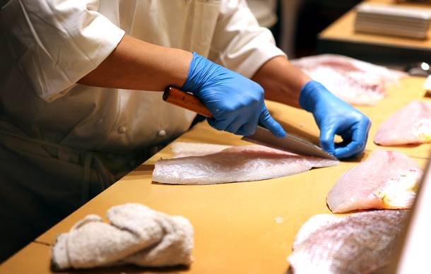 Chefs cut fresh fish at the new Nobu Restaurant at Caesars Palace in Las Vegas on Friday, February 1, 2013.