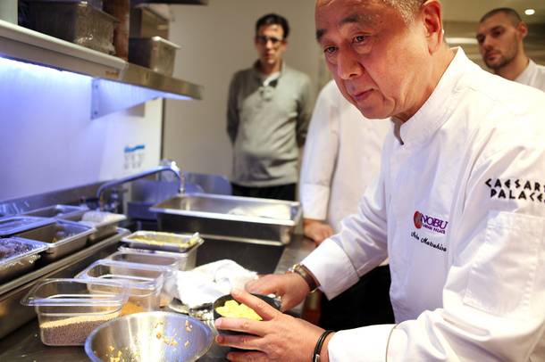Chef Nobu Matsuhisa cooks egg donburi at the new Nobu Restaurant at Caesars Palace in Las Vegas on Friday, February 1, 2013.