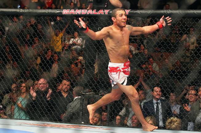 Jose Aldo reacts after retaining his featherweight belt after winning a unanimous decision over Frankie Edgar at UFC 156 Saturday, Feb. 2, 2013 at the Mandalay Bay Events Center.