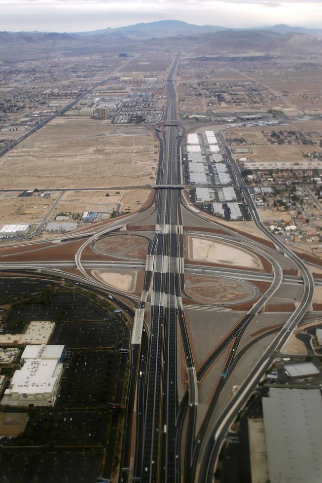 Looking south, the intersection of Interstate 15 and Interstate 215 on the left and Clark County Route 215 on the right is seen Sunday, Feb. 3, 2013.