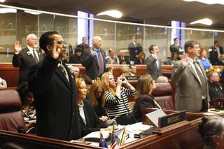 Assemblyman Steven Brooks is sworn in along with the rest of the assembly on the first day of the 2013 legislative session Monday, Feb. 4, 2013 in Carson City.