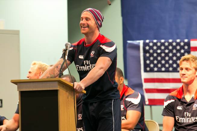 Luke Hume of the USA Eagels Rugby Team answers questions from students during a pep rally at Glen Taylor Elementary School, Tuesday Feb. 5, 2013.