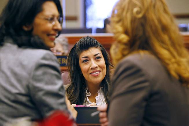From left, Assemblywomen Olivia Diaz, Lucy Flores and Assembly Speaker Marilyn Fitzpatrick talk before the start of an Assembly session during the third day of the 2013 legislative session Wednesday, Feb. 6, 2013 in Carson City.