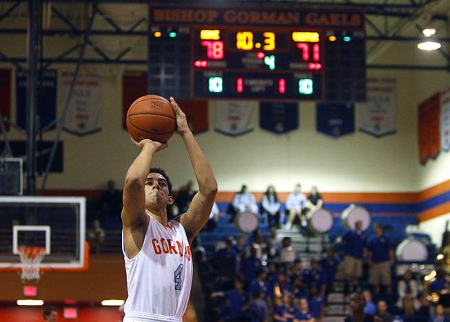Bishop Gorman's Trey Kennedy sinks his free throws with seconds left on the clock during double overtime against Centennial High School at Bishop Gorman Thursday, Feb. 7, 2013. Bishop Gorman beat Centennial 79-71 in double overtime.
