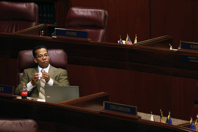 Assemblyman Steven Brooks sits alone after a floor session Thursday, Feb. 7, 2013 during the 2013 legislative session in Carson City. Brooks announced during the session that he would take a leave of absence to address health issues.