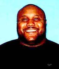 In this image provided by the Irvine, Calif., Police Department, former Los Angeles police officer Christopher Jordan Dorner is shown. A manhunt spread across southern California on Thursday, Feb. 7, 2013, for Dorner, a former Los Angeles police officer, who has threatened to kill police, is being sought in two weekend killings and is a suspect in an overnight shooting that killed one officer and critically wounded another.