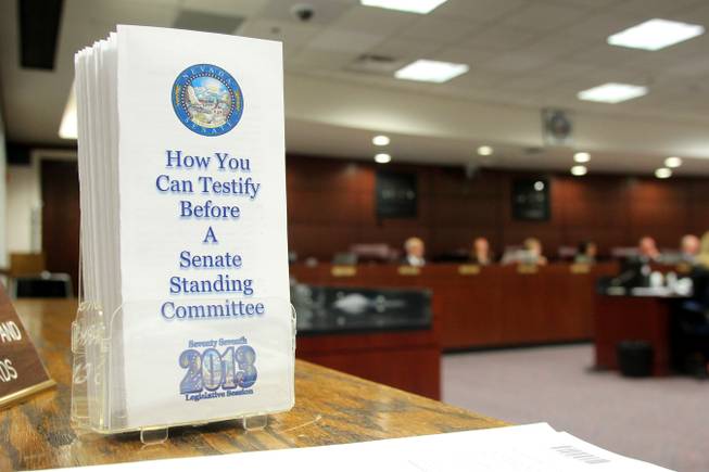 A pamphlet with information on how to testify is seen in a Senate hearing room Friday, Feb. 8, 2013 during the 2013 legislative session in Carson City.