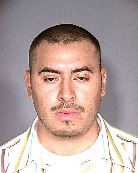 This is a previous booking photo of Javier Reyes that Metro Police had on file.