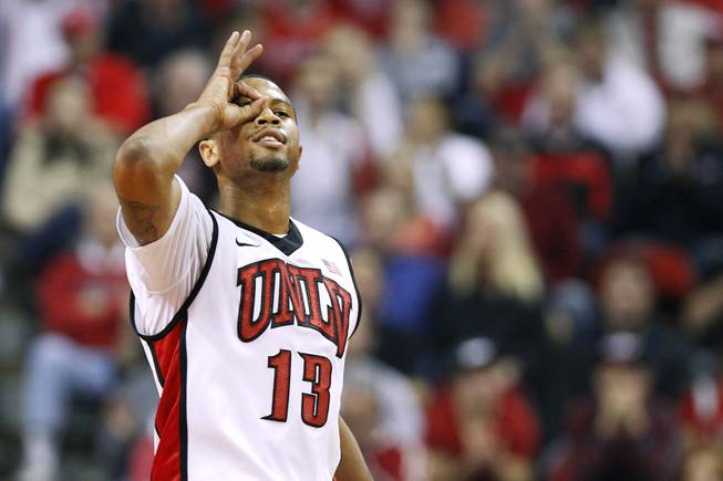 UNLV guard Bryce Dejean-Jones signals a successful three-point basket against New Mexico during their game Saturday, Feb. 9, 2013 at the Thomas & Mack Center.