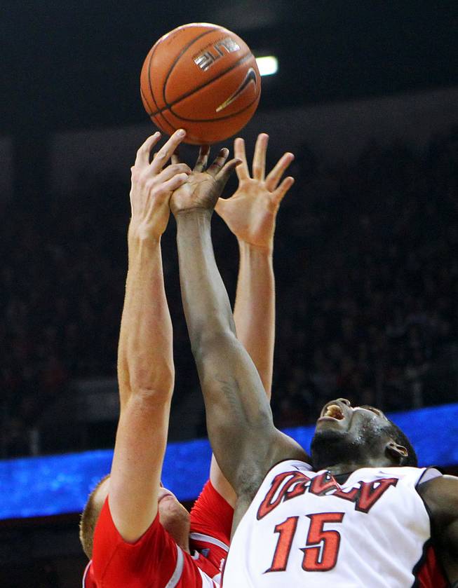 UNLV forward Anthony Bennett and New Mexico center Alex Kirk reach for a rebound during their game Saturday, Feb. 9, 2013 at the Thomas & Mack Center. UNLV beat New Mexico 64-55.
