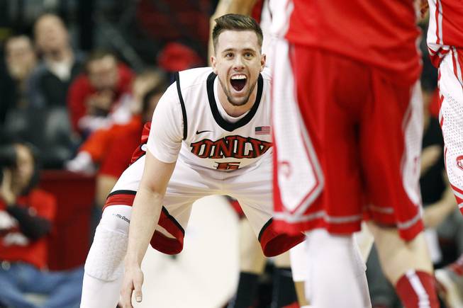 UNLV guard Katin Reinhardt reacts while getting back on defense after sinking a three-point basket against New Mexico Saturday, Feb. 9, 2013 at the Thomas & Mack Center. UNLV beat New Mexico 64-55.