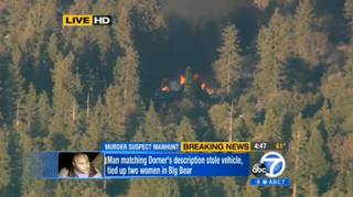 In this image taken from video provided by KABC-TV, the cabin in Big Bear, Calif. where ex-Los Angeles police officer Christopher Dorner is believed to be barricaded inside is in flames Tuesday, Feb. 12, 2013. 