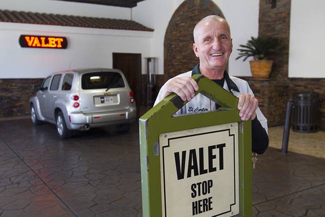 Valet attendant Leo Heffner poses at the porte cochere at the El Cortez in downtown Las Vegas Wednesday, Feb.13, 2013.
