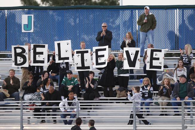 Palo Verde fans hold up a sign during the district championship for flag football against Silverado Wednesday, Feb. 13, 2013. Palo Verde won the game 7-6.