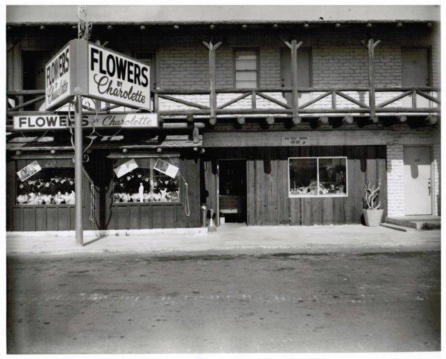 A black and white photo of Charolette Richard's business "Flowers by Charolette."