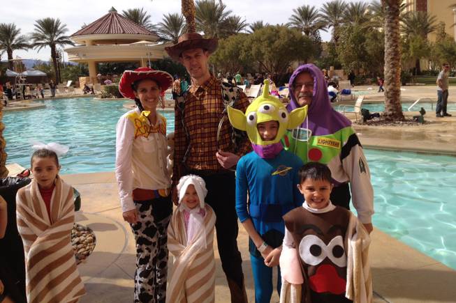 The Reid family poses in Toy Story costumes after plunging into the South Point pool for the Special Olympics Nevada Polar Bear Plunge on Saturday, Feb. 16, 2013. The family members were among more than 150 participants at the fundraiser event. 