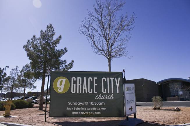 A Grace City Church banner directs people into Jack Schofield Middle School on Sunday, Feb. 17, 2013. The new Las Vegas church rents out the Jack Schofield Middle School auditorium as a temporary venue to hold they're Sunday services.
