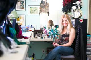 Local fashion designer Clair Vranian works out of her home studio, Monday, Feb. 18, 2013.