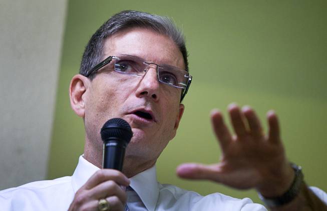 Congressman Joe Heck (R-NV) responds to a question during a town hall meeting with constituents at Pacific Pines Senior Apartments in Henderson Tuesday, Feb.19, 2013.