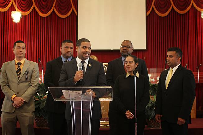 Rep. Steven Horsford (at podium), D - Las Vegas, stands with a collection of representatives from community organizations while discussing reform of the U.S. immigration system. The congressman is flanked by (left to right) Evan Louie of the Asian American and Pacific Islander Democrats, Hugo Stanley, of the Las Vegas Pacific Islander community, Richard Boulware of the Las Vegas NAACP, Marisol Montoya, Mi Familia Vota, and Sanje Sedera, Asian American Democratic Caucus in Las Vegas. The organizations came together with Horsford on Tues. Feb. 19, 2013 to advocate for immigration reform.