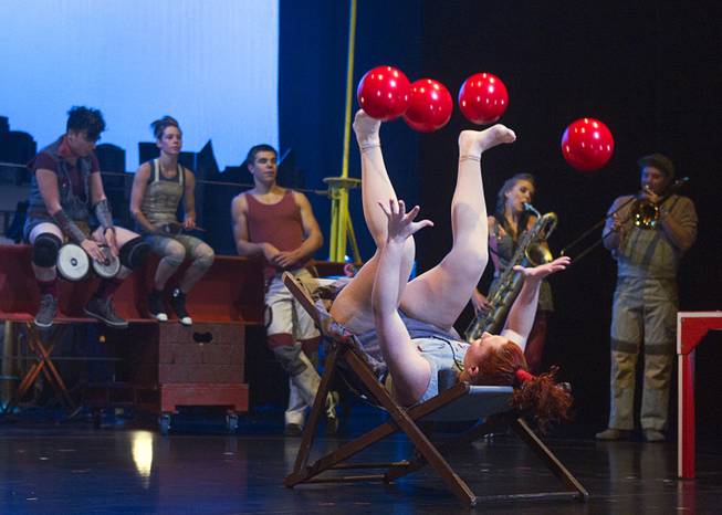 Circus Oz performer Hazel Bock juggles balls with her hands and feet during a rehearsal at the Smith Center for the Performing Arts Thursday, Feb. 210, 2013. The Australian-based troupe will be performing at the Smith Center Thursday through Saturday.