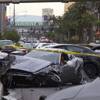 Wrecked cars are shown after a shooting and multi-car accident that left three people dead and three injured on the Las Vegas Strip early Thursday morning Feb. 21, 2013. EDITOR’S NOTE: This photo has been digitally altered to obscure an image of one of the victims.

