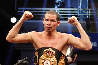 Richard Abril of Cuba celebrates after defending his WBA lightweight title against Sharif Bogere of Uganda at the Hard Rock Hotel in Las Vegas, Nevada March 2, 2013. Abril retained his title with an unanimous decision victory.
