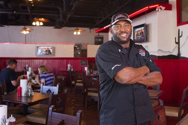 Chef and owner Jimmy Cole at his Top Notch Barbeque restaurant at Serene and Eastern avenues. The restaurant is in the same building but is separate from the Doc Holliday's tavern.