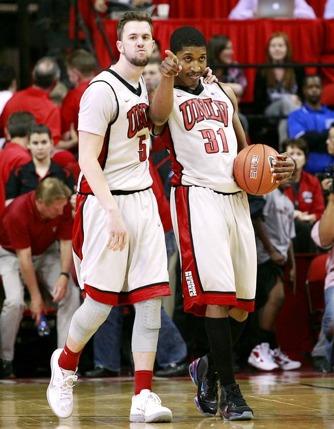 UNLV guards Katin Reinhardt and Justin Hawkins walk towards their free throw line after Hawkins picked up a steal and was fouled in the closing seconds of their game against Boise State Tuesday, March 5, 2013 at the Thomas & Mack Center. UNLV won the game 68-64.
